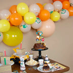 Yellow and orange construction themed cups on kids birthday table Parte Haus party supply store in Bethesda Maryland