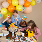 yellow construction cups with playful vehicles birthday theme from Parte Haus party supply store in Bethesda Maryland