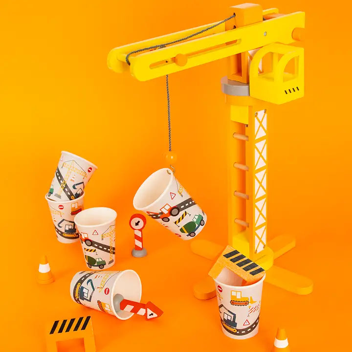 Yellow construction cups with truck graphics kids birthday theme from Parte Haus party supply store in Bethesda MD