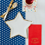 Cream star shaped dinner plate with gold trim for patriotic celebration from Parte Haus party supply store in Bethesda MD