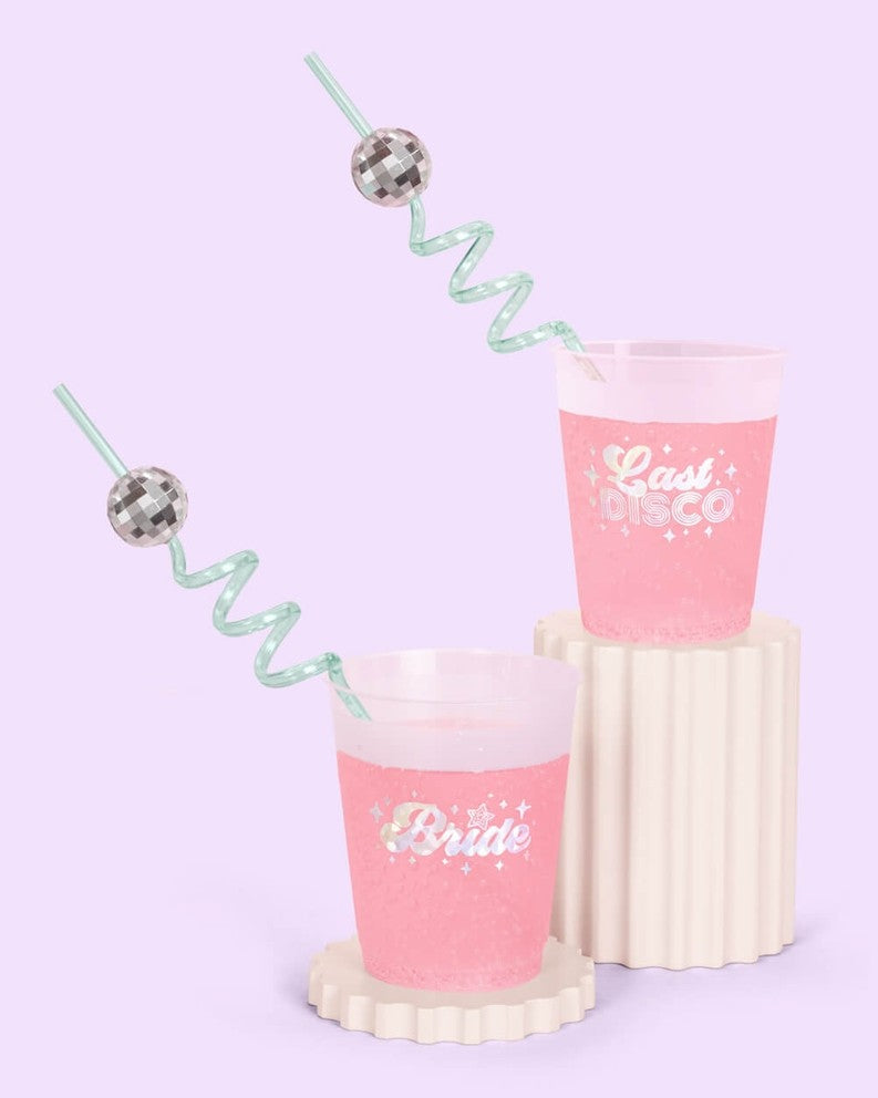Pink disco bachelorette cups with swirl straws bride and last disco text from Parte Haus party supply store in Bethesda MD