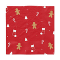 Red napkin with gingerbread man candy cane stocking and tree Christmas design from Parte Haus party supply store in Bethesda, Maryland.