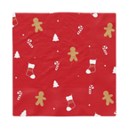 Red napkin with gingerbread man candy cane stocking and tree Christmas design from Parte Haus party supply store in Bethesda, Maryland.