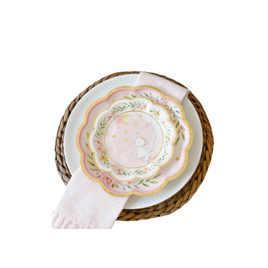 Pink elephant baby shower paper plates with floral and star design from Parte Haus party supply store in Bethesda MD