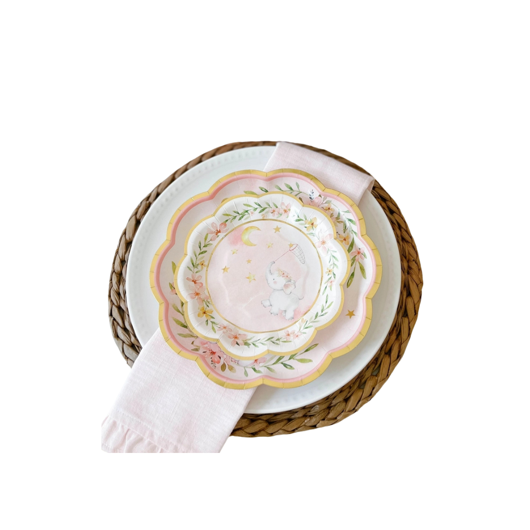 Pink elephant baby shower paper plates with floral and star design from Parte Haus party supply store in Bethesda MD