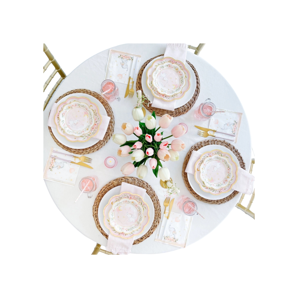 Pink elephant baby shower plates with floral accents on decorated table from Parte Haus party supply store in Bethesda MD