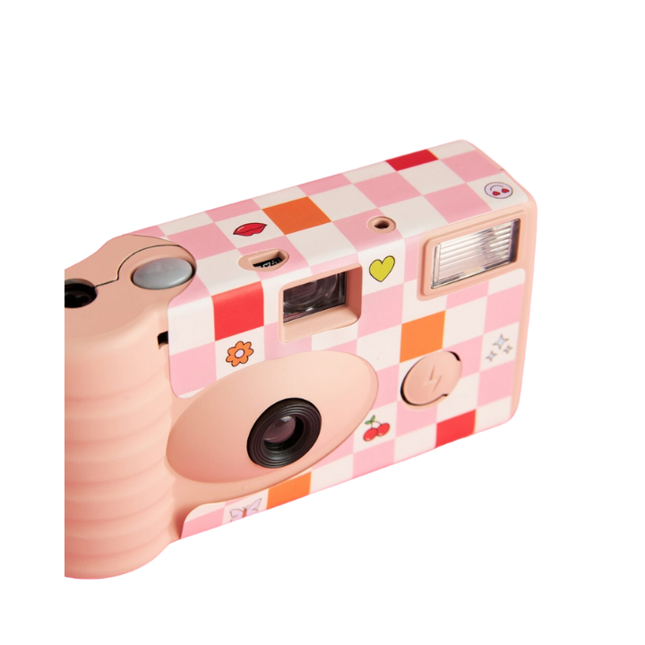 Pink and orange checkered disposable camera with fun icons birthday theme from Parte Haus party supply store in Bethesda MD