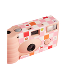 Pink and orange checkered disposable camera with fun icons birthday theme from Parte Haus party supply store in Bethesda MD