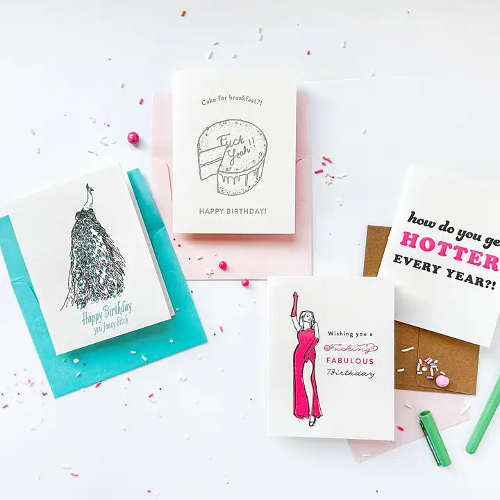 Colorful birthday greeting cards with fun illustrations and messages birthday theme from Parte Haus party supply store in Bethesda Maryland