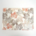 Autumn leaf paper placemats with orange and brown leaves Thanksgiving table decor from Parte Haus party supply store in Bethesda Maryland