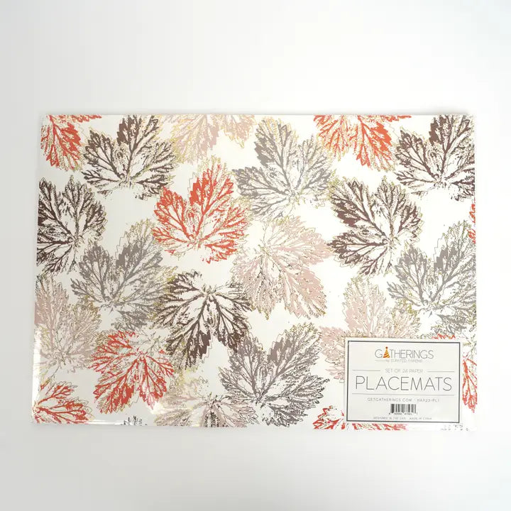 Autumn leaf paper placemats with orange and brown leaves Thanksgiving table decor from Parte Haus party supply store in Bethesda Maryland