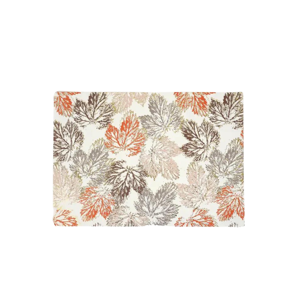 Multicolor fall leaves paper placemat with autumn leaf pattern Thanksgiving décor from Parte Haus party supply store in Bethesda Maryland