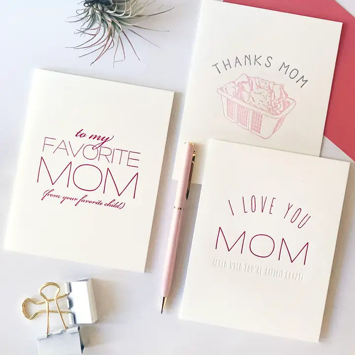White letterpress Mother's Day greeting cards with pink text for mom from Parte Haus party supply store in Bethesda Maryland