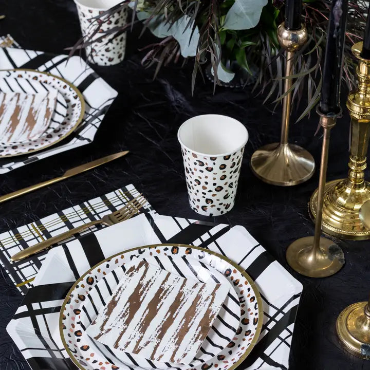 Black and gold cocktail napkins with modern stripe design table setting celebration from Parte Haus party supply store in Bethesda Maryland