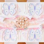 Pastel butterfly plates and tableware on a kids birthday table setting from Parte Haus party supply store in Bethesda Maryland
