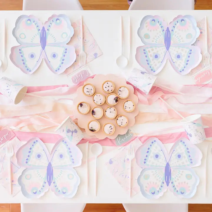 Pastel butterfly plates and tableware on a kids birthday table setting from Parte Haus party supply store in Bethesda Maryland