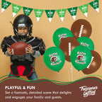 Green and brown football balloons and kid in helmet football birthday theme from Parte Haus party supply store in Bethesda MD