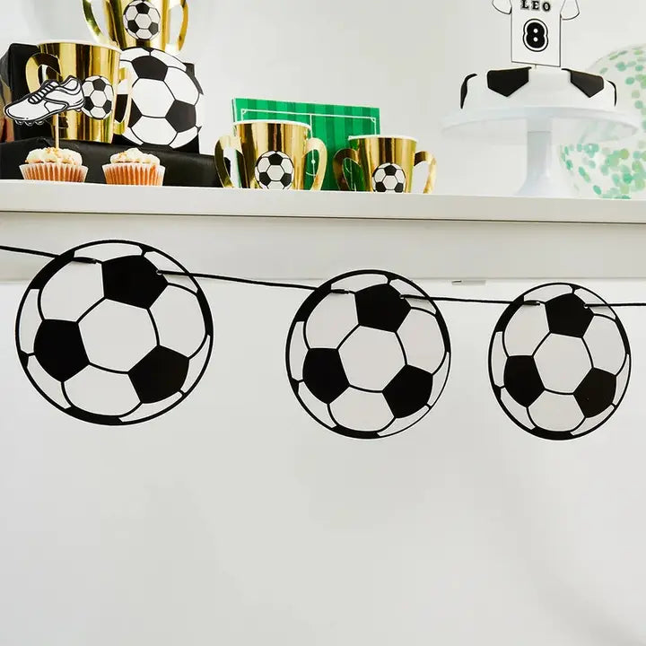 Black and white soccer ball garland banner sports theme birthday from Parte Haus party supply store in Bethesda Maryland