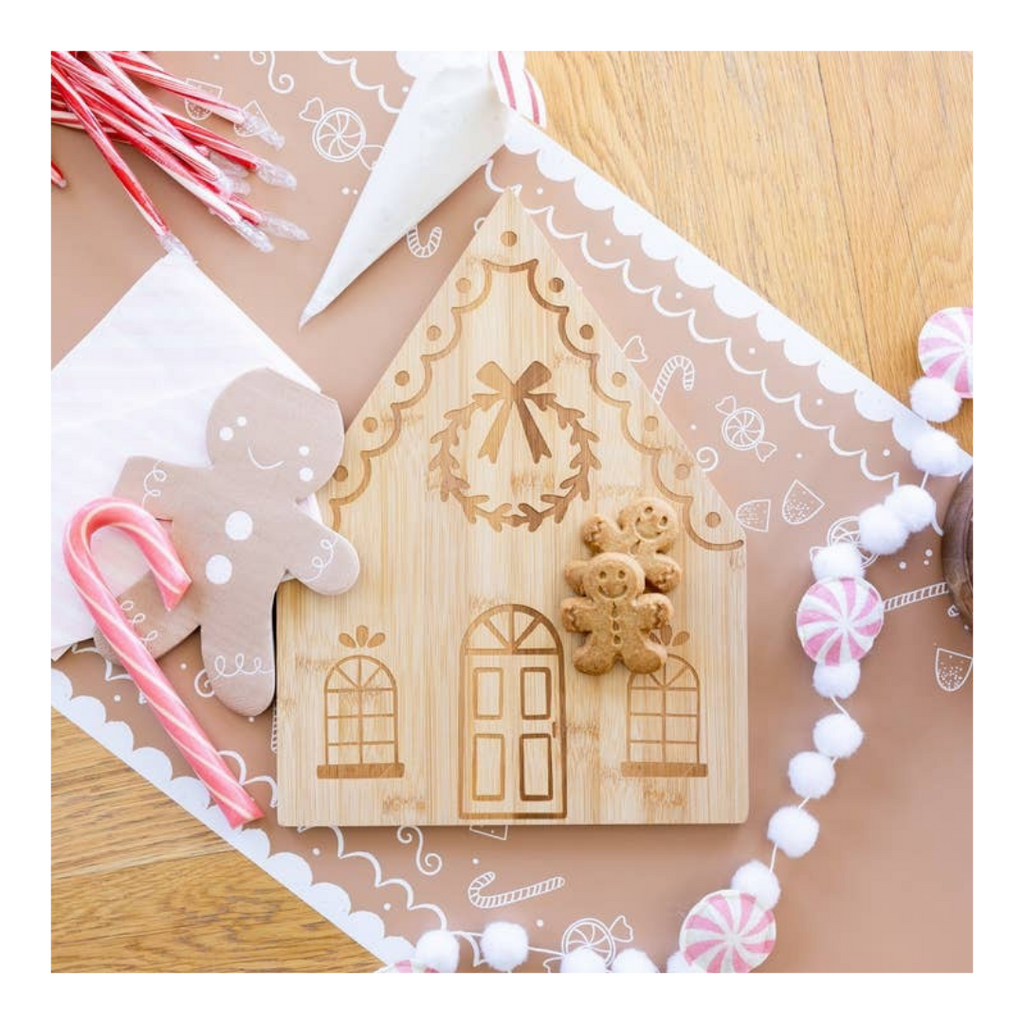 Natural wood gingerbread house tray with gingerbread cookies Christmas theme from Parte Haus party supply store in Bethesda MD