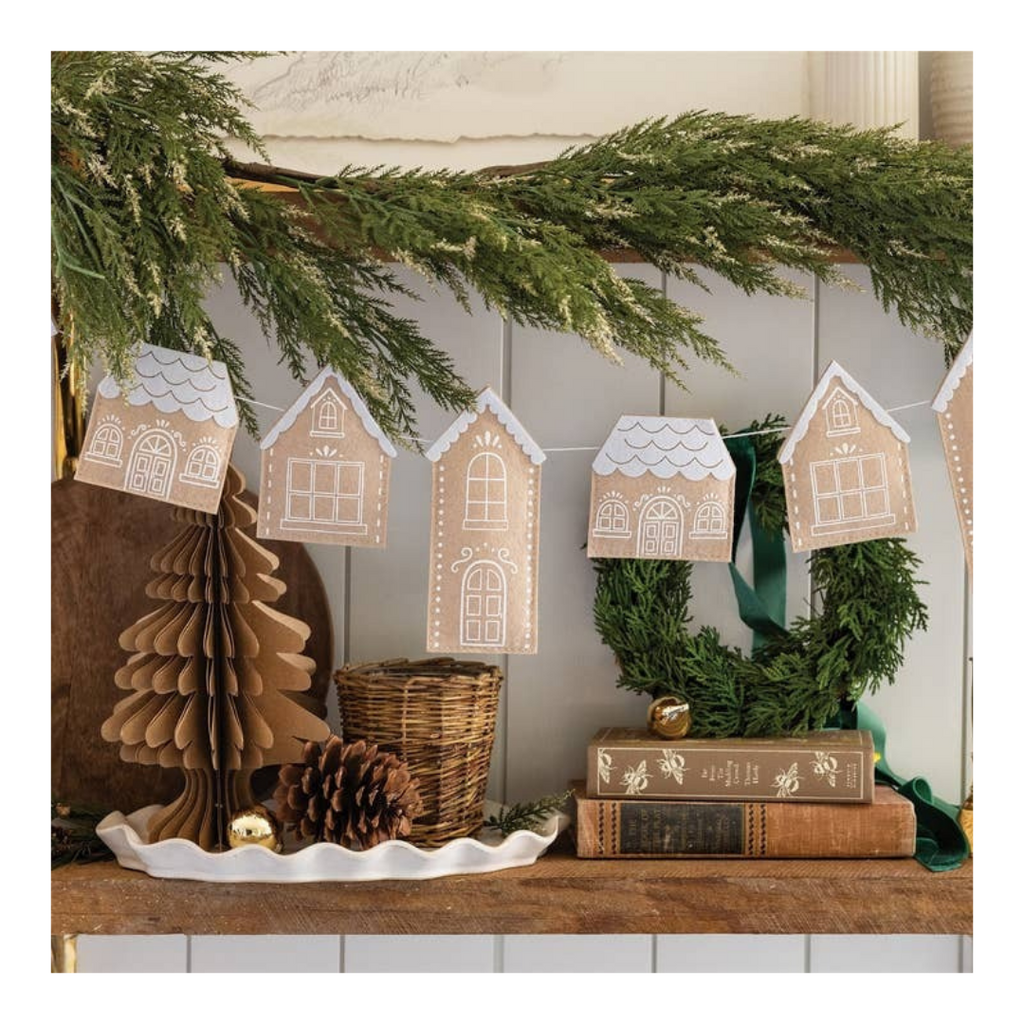 Brown gingerbread house garland holiday banner Christmas decor from Parte Haus party supply store in Bethesda Maryland