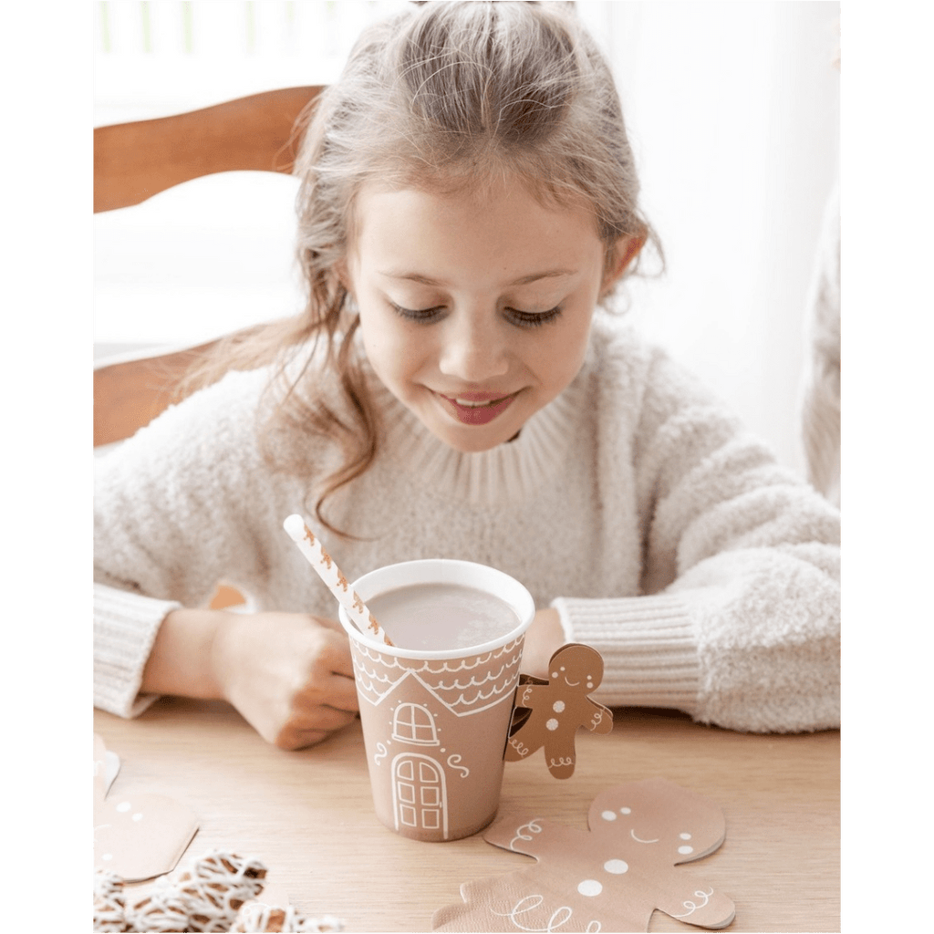 Brown gingerbread house paper cup with straw for Christmas from Parte Haus party supply store in Bethesda MD