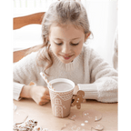 Brown gingerbread house paper cup with straw for Christmas from Parte Haus party supply store in Bethesda MD