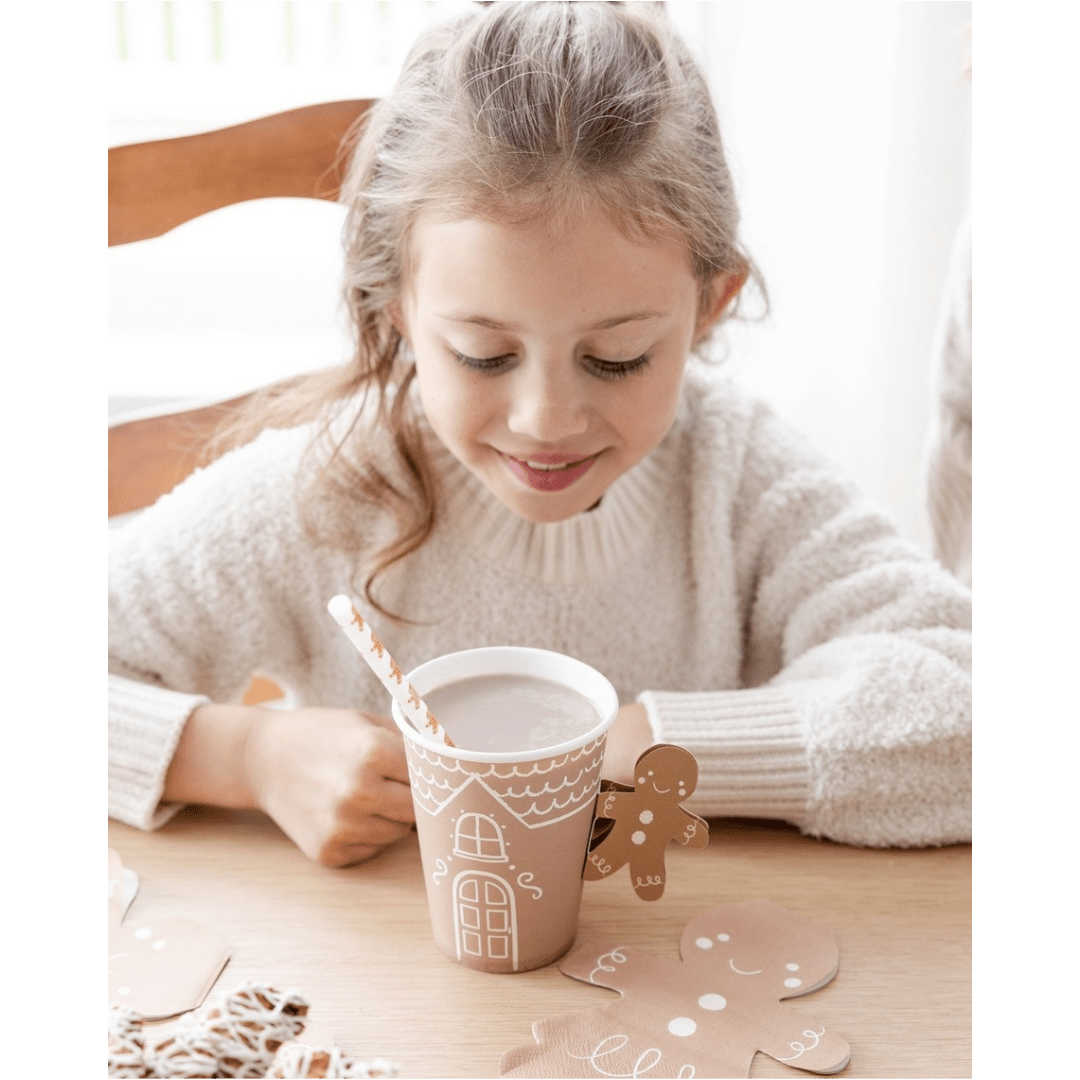 Brown gingerbread house paper cup with straw for Christmas from Parte Haus party supply store in Bethesda MD