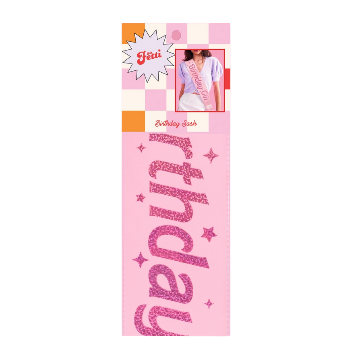 Pink glitter birthday sash with stars for birthday celebration from Parte Haus party supply store in Bethesda MD
