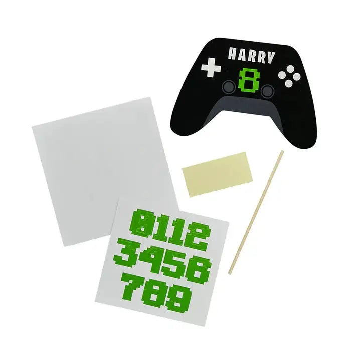 Black game controller cake topper kit with green pixel numbers video game birthday from Parte Haus party supply store in Bethesda MD