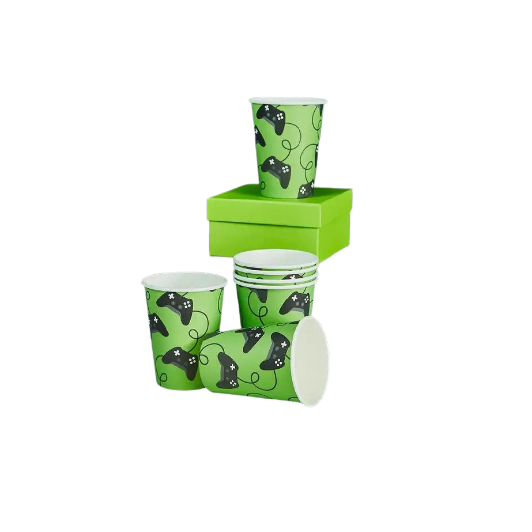 Green game controller paper cups with black controller print for gaming birthday from Parte Haus party supply store in Bethesda Maryland