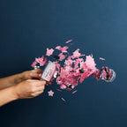 Pink confetti push pop with stars for gender reveal celebration from Parte Haus party supply store in Bethesda MD