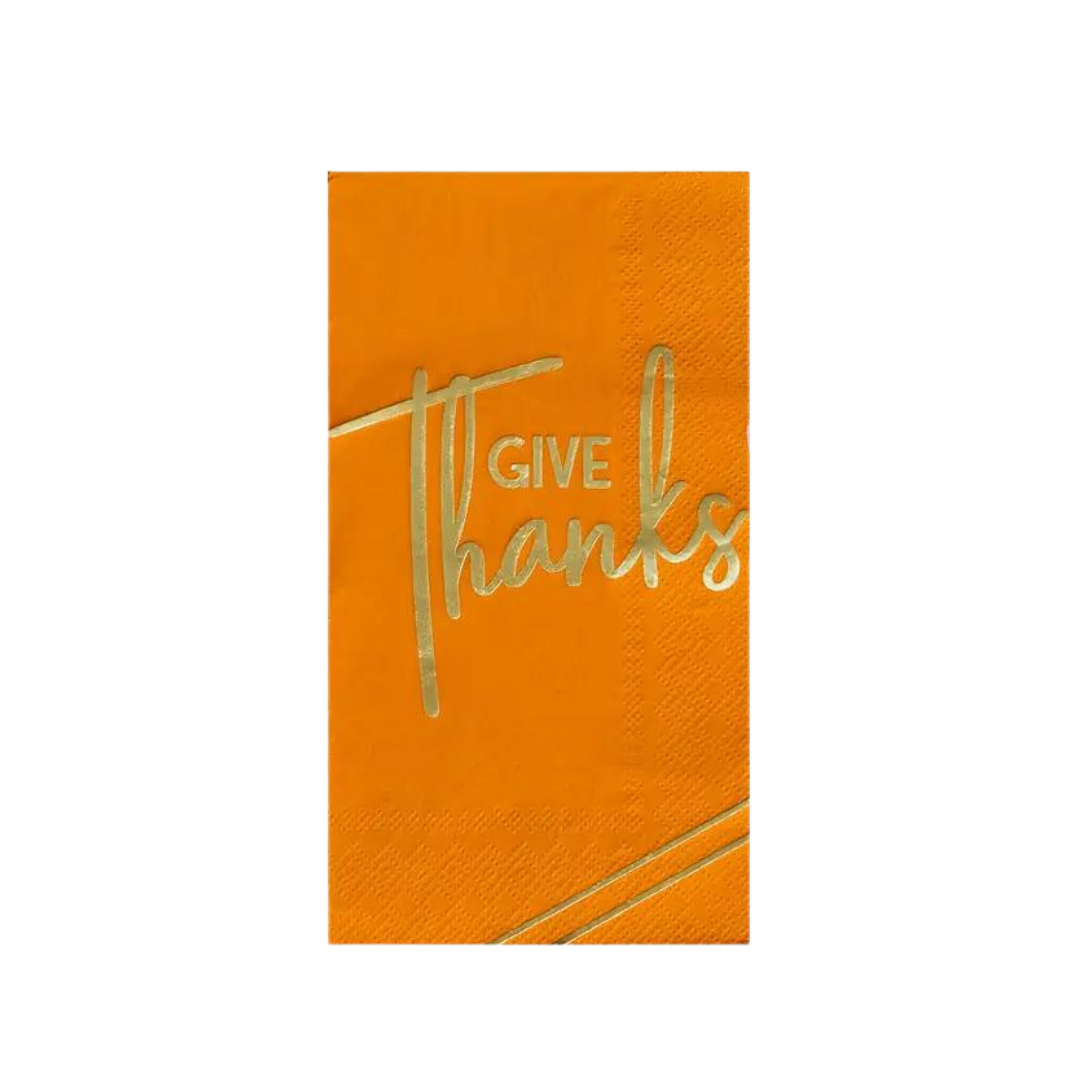 Orange guest napkin with gold Give Thanks text Thanksgiving from Parte Haus party supply store in Bethesda MD.