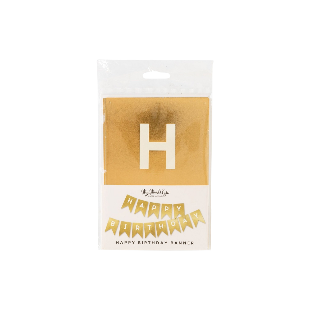 Gold foil happy birthday word banner for birthday celebration from Parte Haus party supply store in Bethesda MD