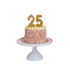Gold glitter birthday number candles on cake for birthday celebration from Parte Haus party supply store in Bethesda MD