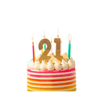 Gold glitter birthday number candles set with rainbow cake for birthday from Parte Haus party supply store in Bethesda Maryland