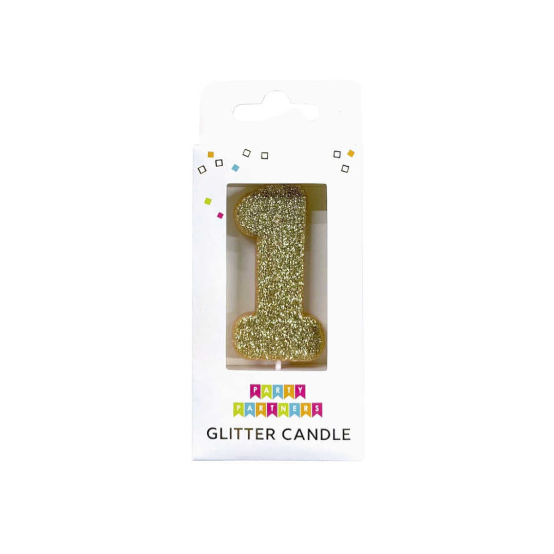 Gold glitter number 1 candle in packaging for birthday celebration from Parte Haus party supply store in Bethesda MD
