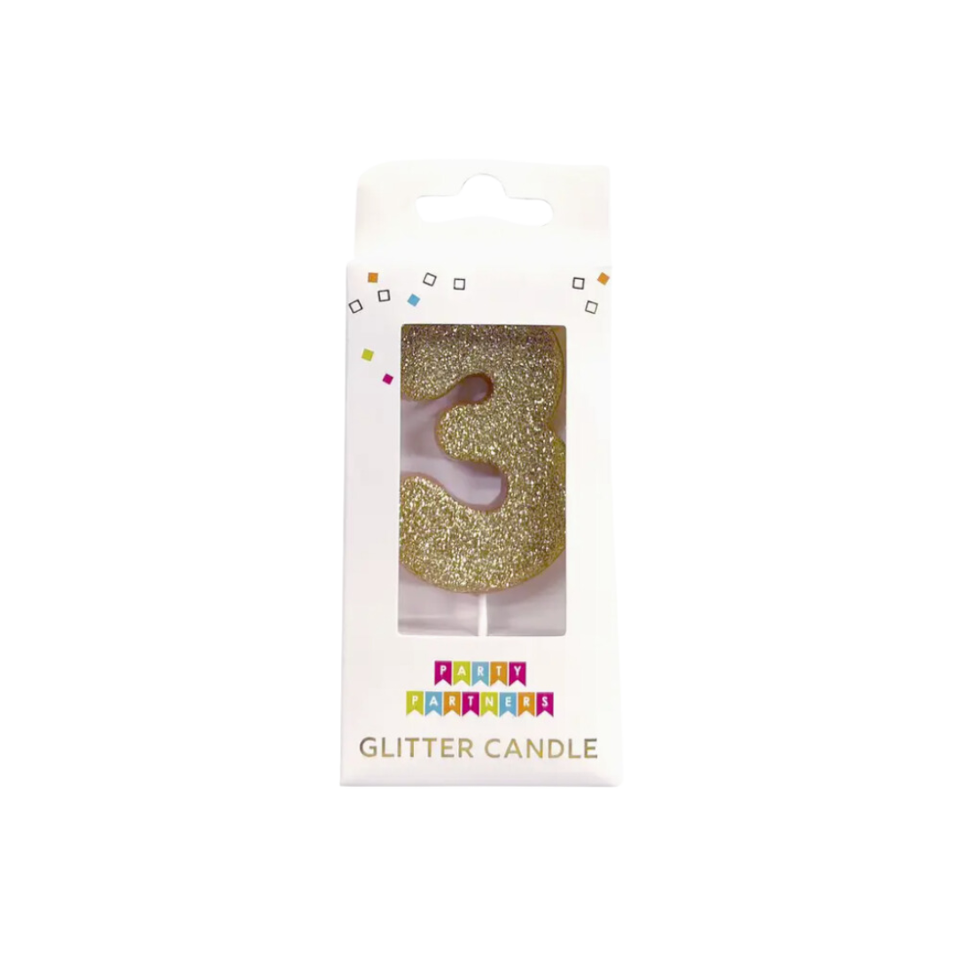 Gold glitter number 3 candle for birthday from Parte Haus party supply store in Bethesda Maryland