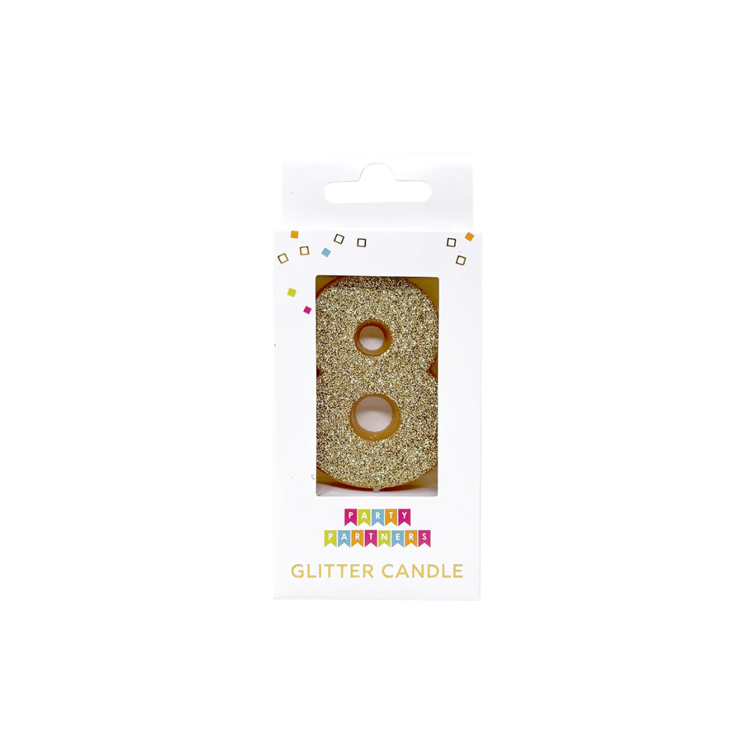Gold glitter number 8 candle for birthdays from Parte Haus party supply store in Bethesda MD