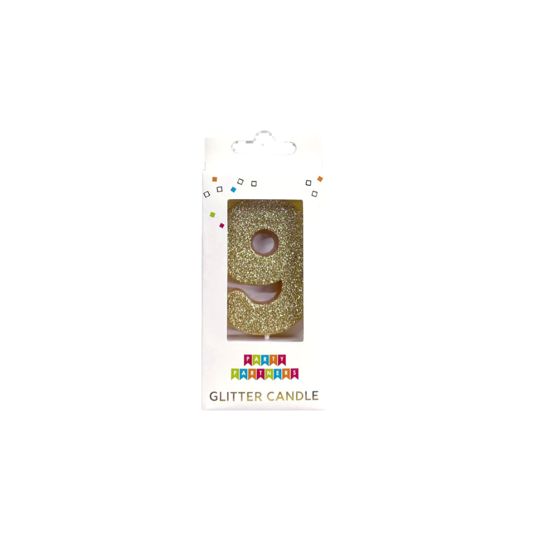 Gold number 9 glitter candle in packaging birthday decoration from Parte Haus party supply store in Bethesda MD