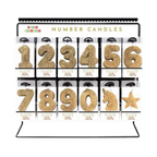 Gold glitter number candle set with unicorn and star birthday display from Parte Haus party supply store in Bethesda Maryland
