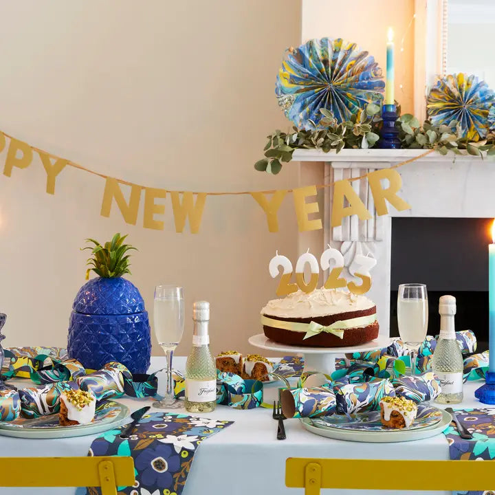Gold Happy New Year banner festive paper decoration New Year theme from Parte Haus party supply store in Bethesda Maryland