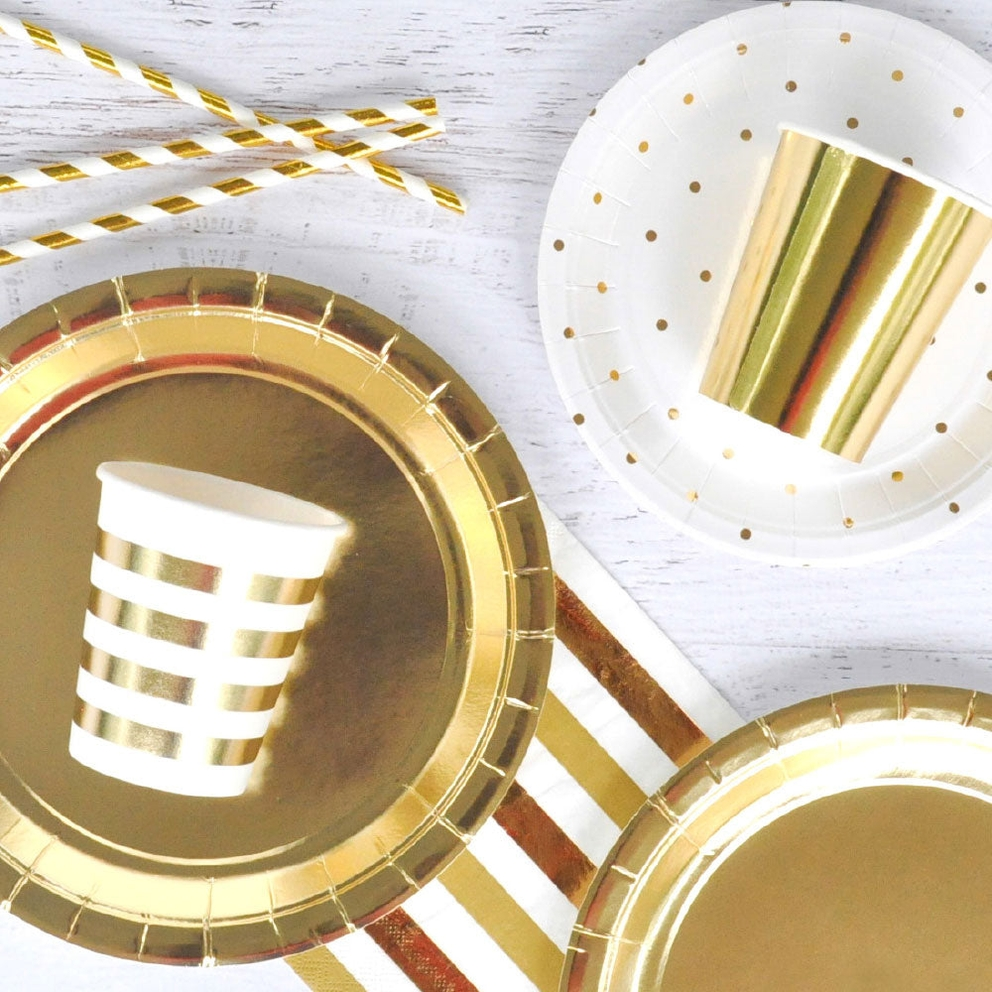 Gold foil cups with stripes and shiny finish for celebrations from Parte Haus party supply store in Bethesda MD
