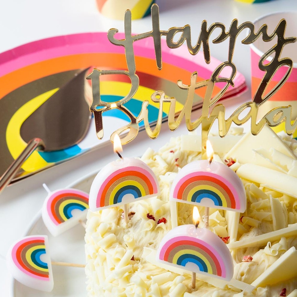 Gold Happy Birthday acrylic cake topper on a white cake birthday from Parte Haus party supply store in Bethesda MD