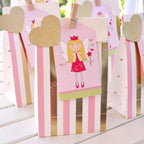 Gold pink treat bag with fairy and stripes for kids birthday from Parte Haus party supply store in Bethesda MD