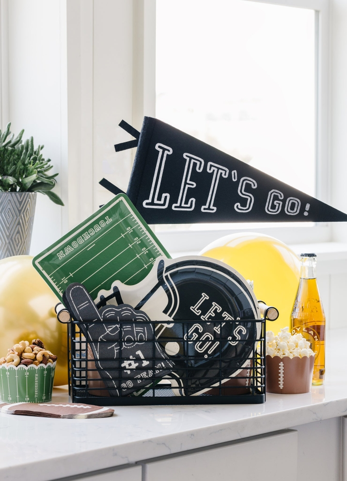 Gray football hand shaped dinner napkins with number one foam finger design for game day from Parte Haus party supply store in Bethesda MD
