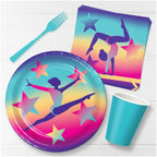 Rainbow gymnastics dinner paper plates with gymnasts and stars birthday theme from Parte Haus party supply store in Bethesda Maryland
