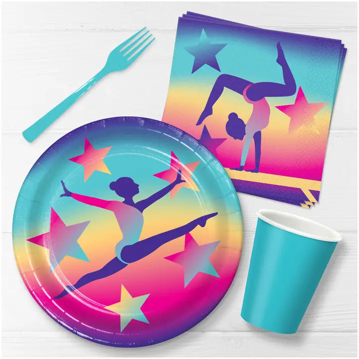 Rainbow gymnastics dinner paper plates with gymnasts and stars birthday theme from Parte Haus party supply store in Bethesda Maryland