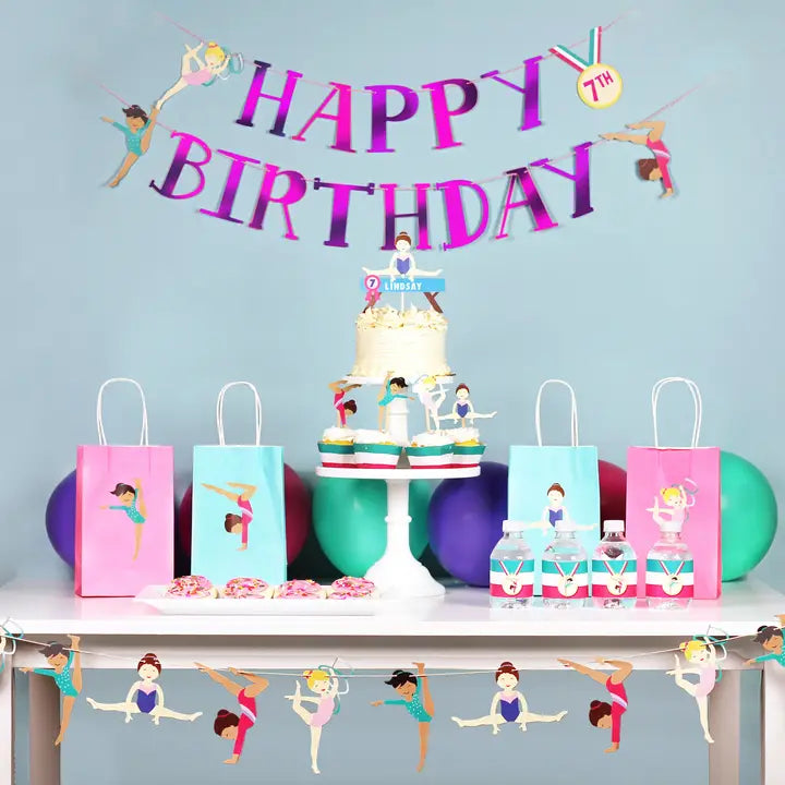 Colorful gymnastics birthday garland with gymnast cutouts for kids party from Parte Haus party supply store in Bethesda Maryland