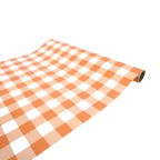 Peach checkerboard table runner with a retro design for birthdays from Parte Haus party supply store in Bethesda MD.