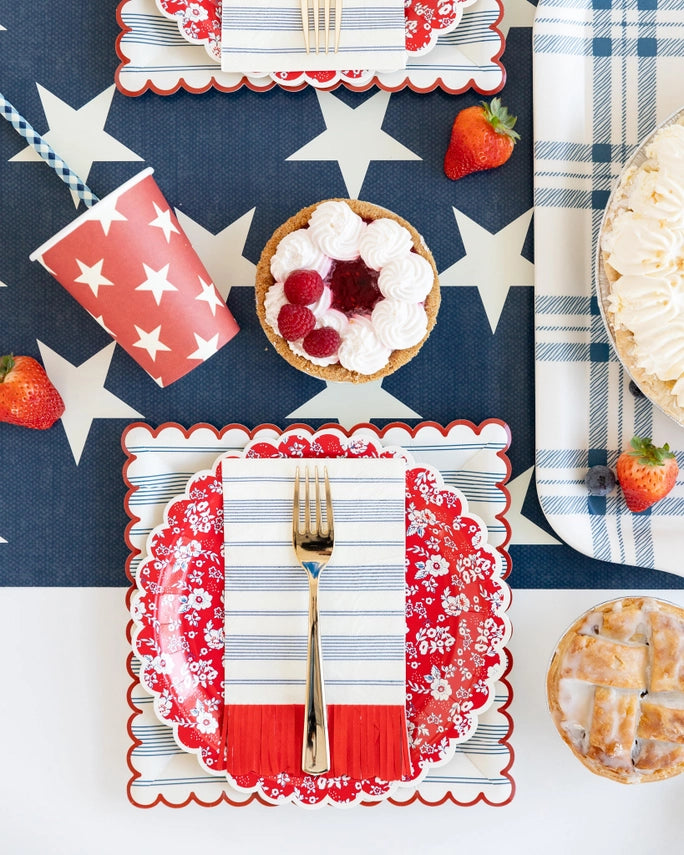 Red and blue star paper cups with striped straw summer picnic tableware Fourth of July theme from Parte Haus party supply store in Bethesda MD